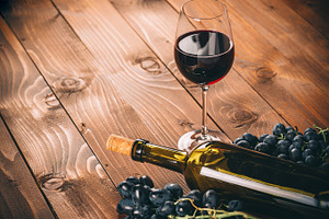 Image result for red wine on  wooden table