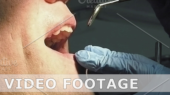 Man Gets Dentist Medical Mouth Teeth Examination