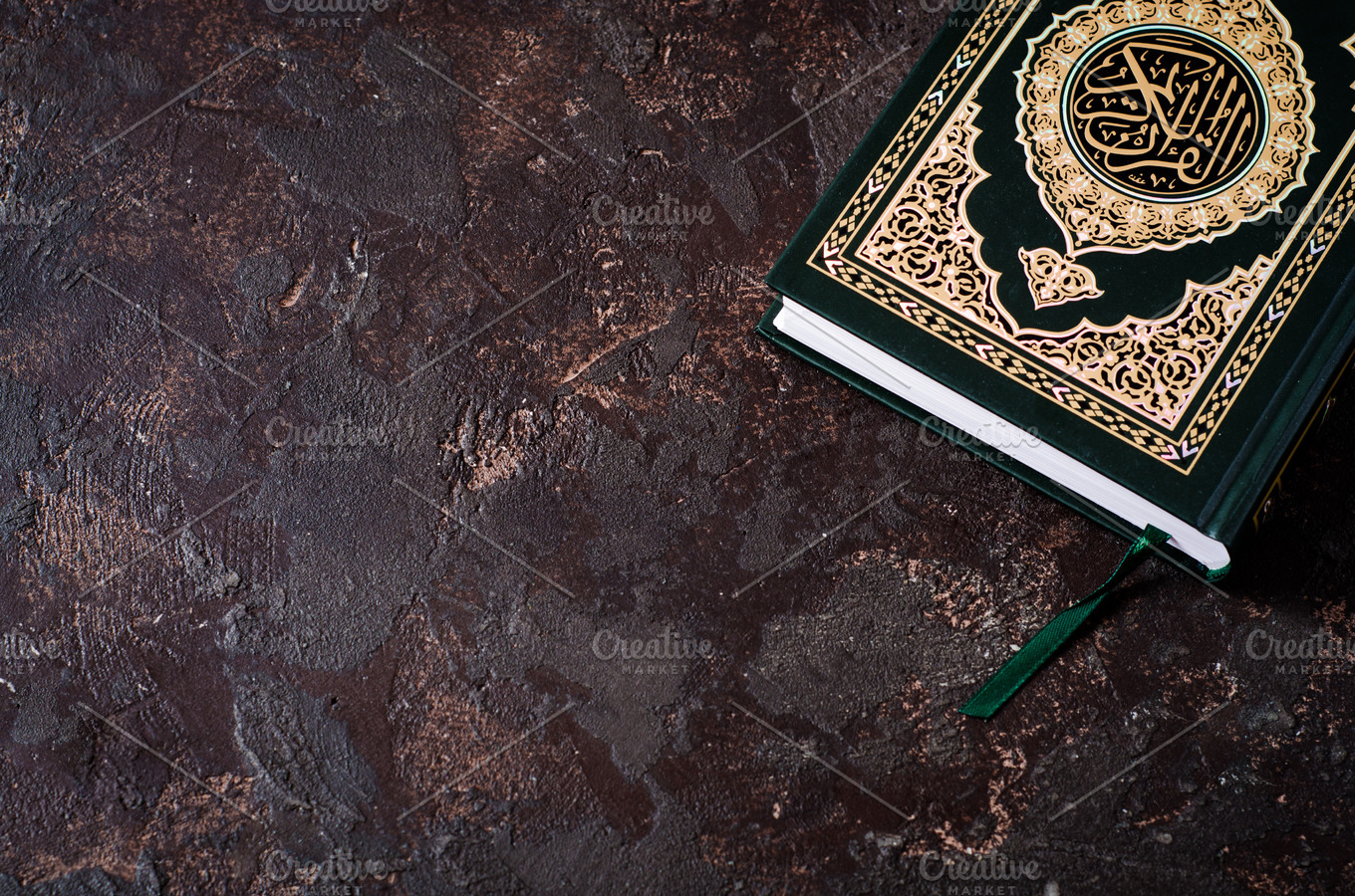 Islamic Book Koran on dark vintage background with arabic  