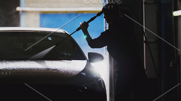 Automobile car washing in workshop - silhouette in Graphics