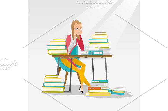 Student Sitting At The Table With Piles Of Books