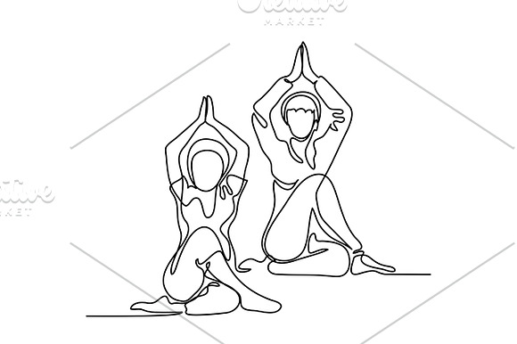 Two Women Doing Exercise In Yoga Pose