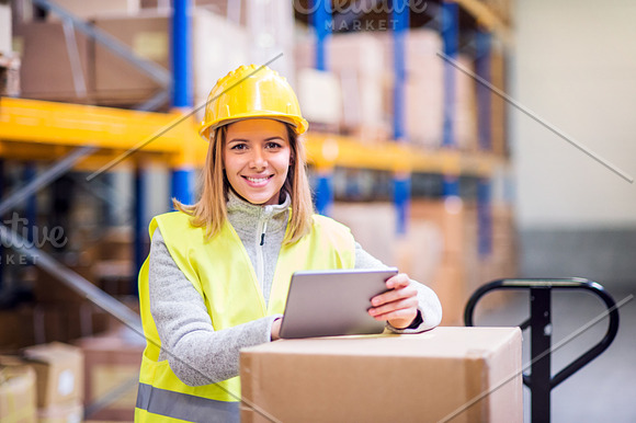 Woman Warehouse Worker With Tablet