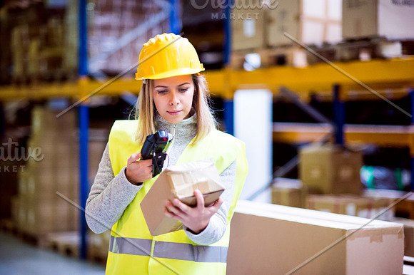 Warehouse Woman Worker With Barcode Scanner