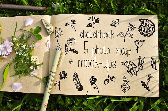 Download Sketchbook Mockup on the grass